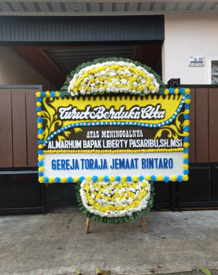Papan Bunga Duka di Palihan